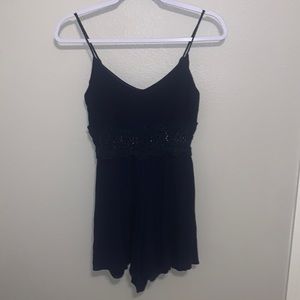 I am selling a navy blue romper! This style is very fun!